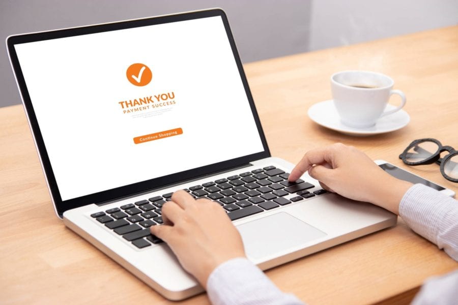 “Thank You” screen on laptop, confirming online customer order